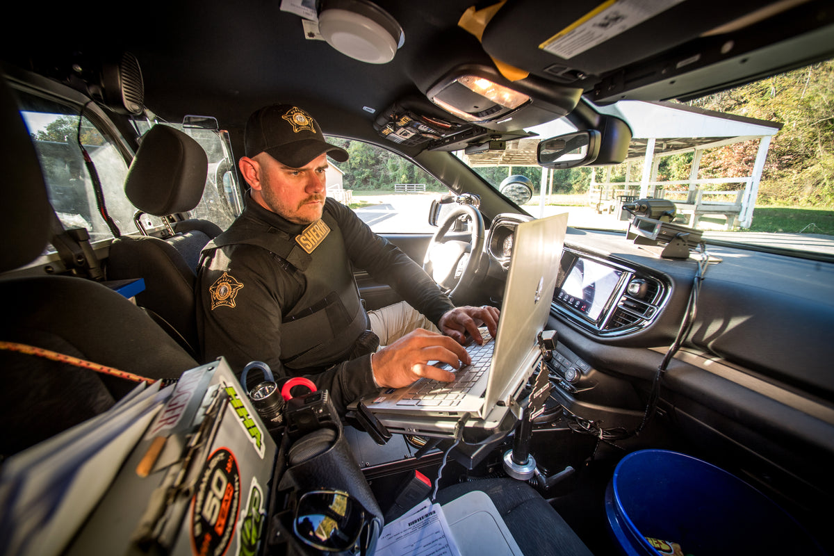 Sheriff's deputy wearing a BulletSafe vest in his patrol car
